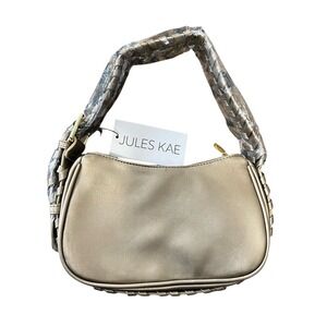 New Jules Kae women's Delilah hand bag in gold. Retails for $130.00.